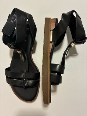 Franco Sarto Black Leather Strappy Ankle-Wrap Flat Sandals with Gold Details